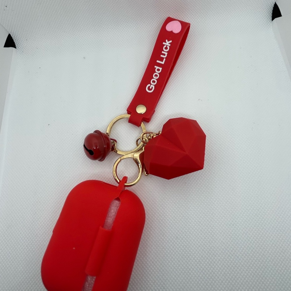 Air pod keychain case with heart charm and bell